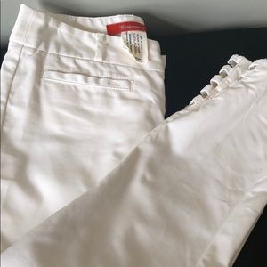 Anthropologie white pants with detail on leg